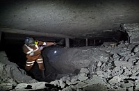 Shovelling stone at Ayle Colliery.