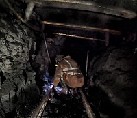 Laying rails in a working at Ayle Colliery.