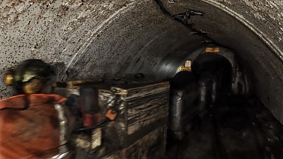 Tubs of coal existing the drift mouth at Ayle Colliery.